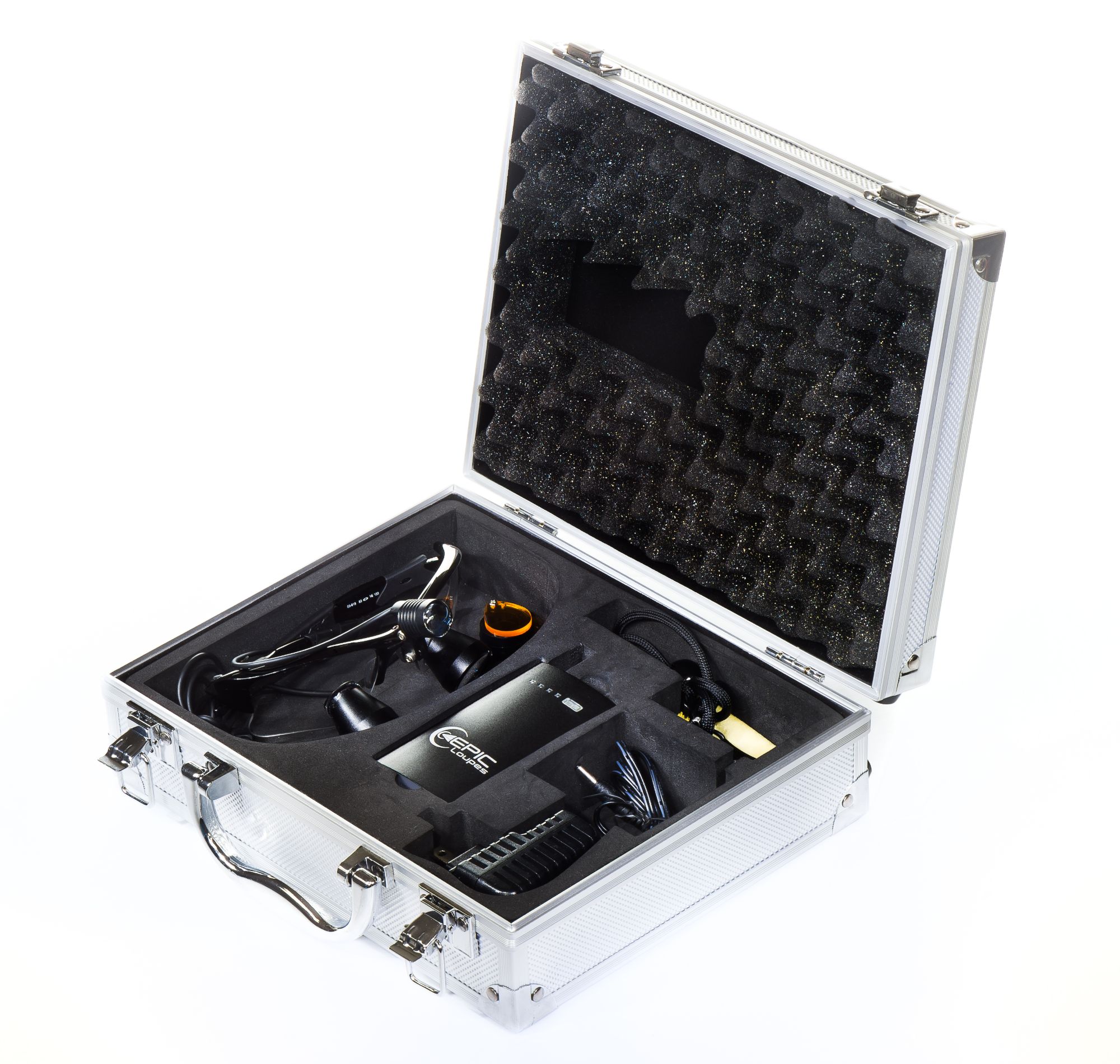 Epic Loupes kit in its aluminum carrying case: loupes with LED headlight, battery pack, charger and lanyard
