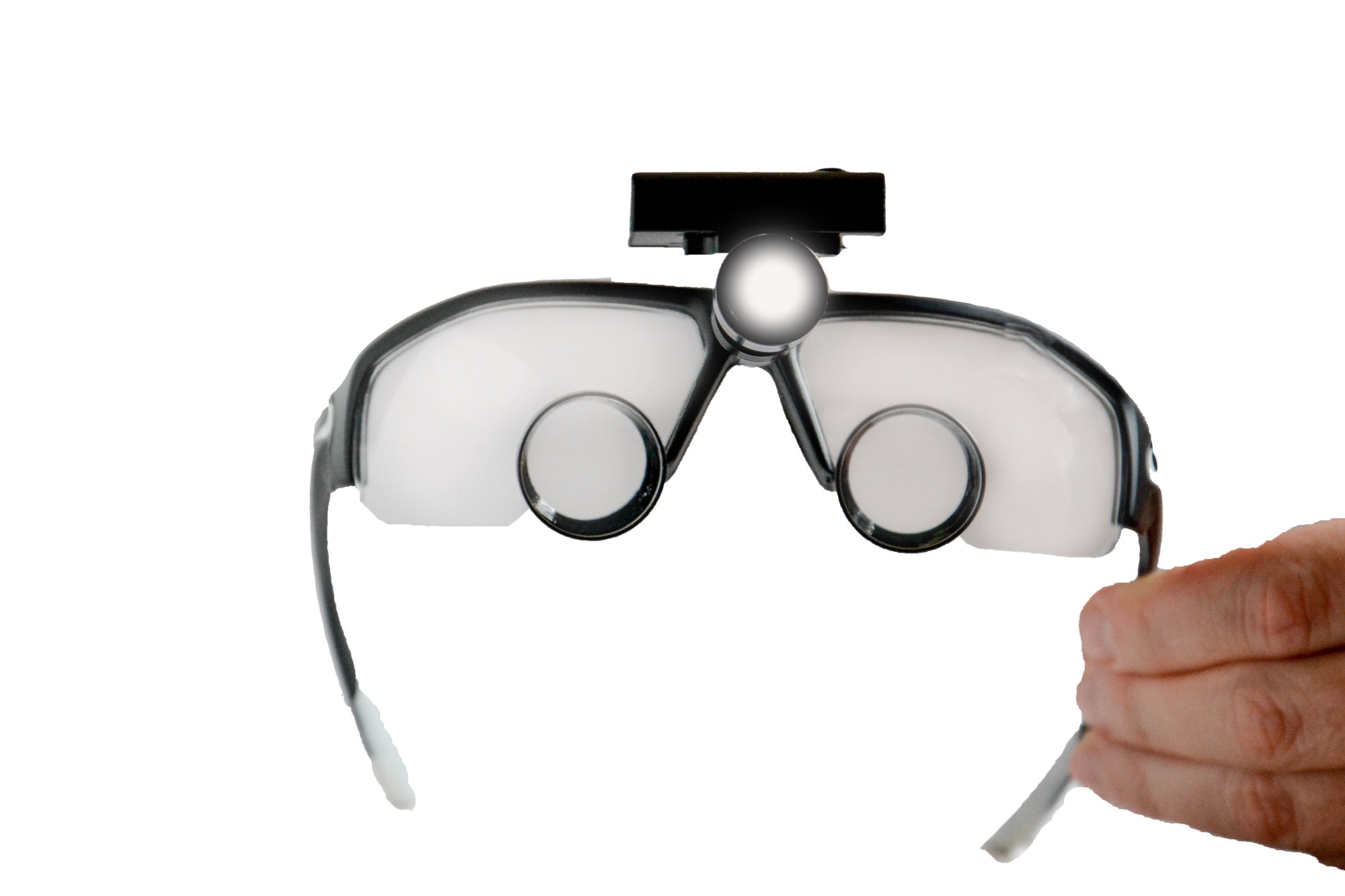 Front view of Epic Loupes with the LED headlight switched on