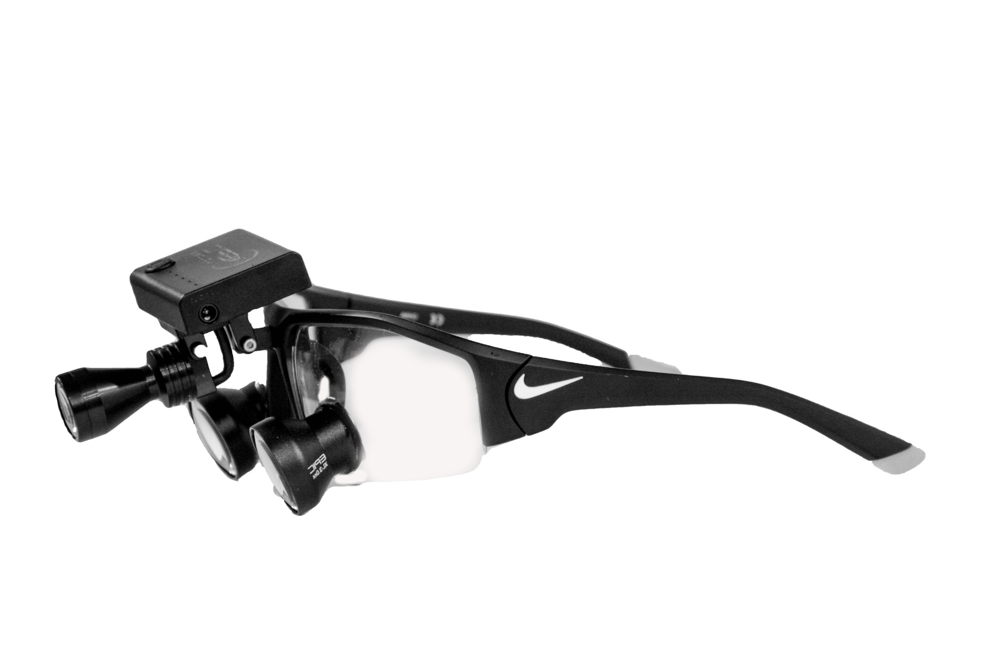 Side view of Epic Loupes on Nike frames with LED headlight and battery